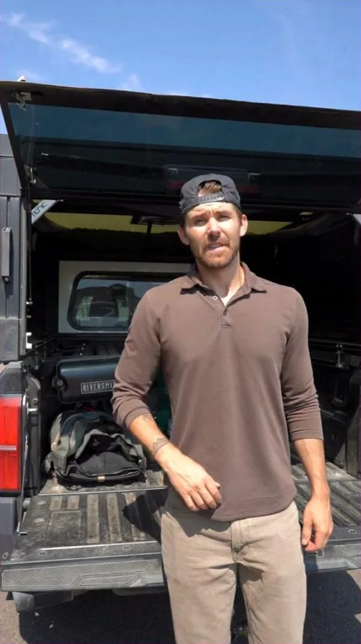 Riversmith Facebook ad - founder with rod carrier at truck tailgate
